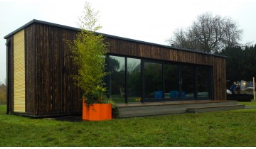 Exterior cladding of shipping container home